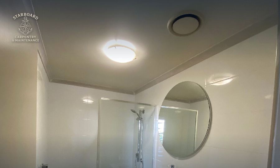Frameless glass shower screen and tiled niche